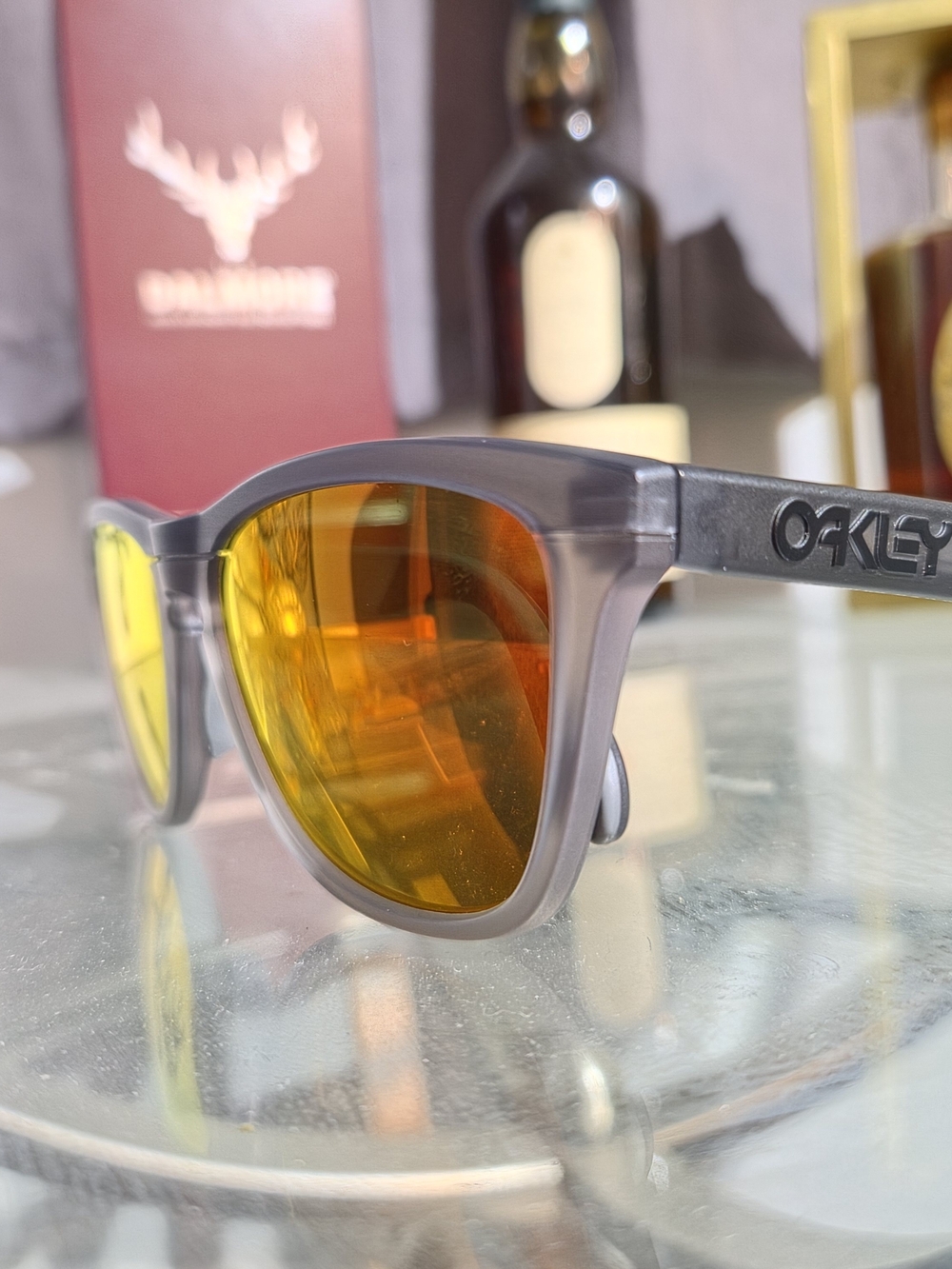Oakley Men’s Sunglasses - Translucent Gray Frame with Orange-Gold Mirror Lenses